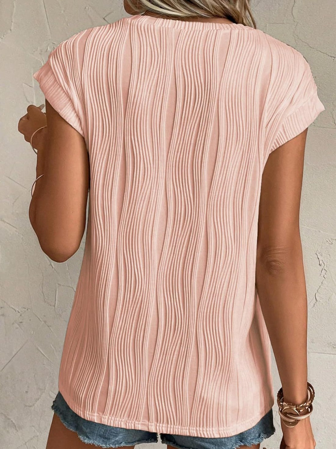 Back view of Women's Peach Textured Round Neck Cap Sleeve T-Shirt