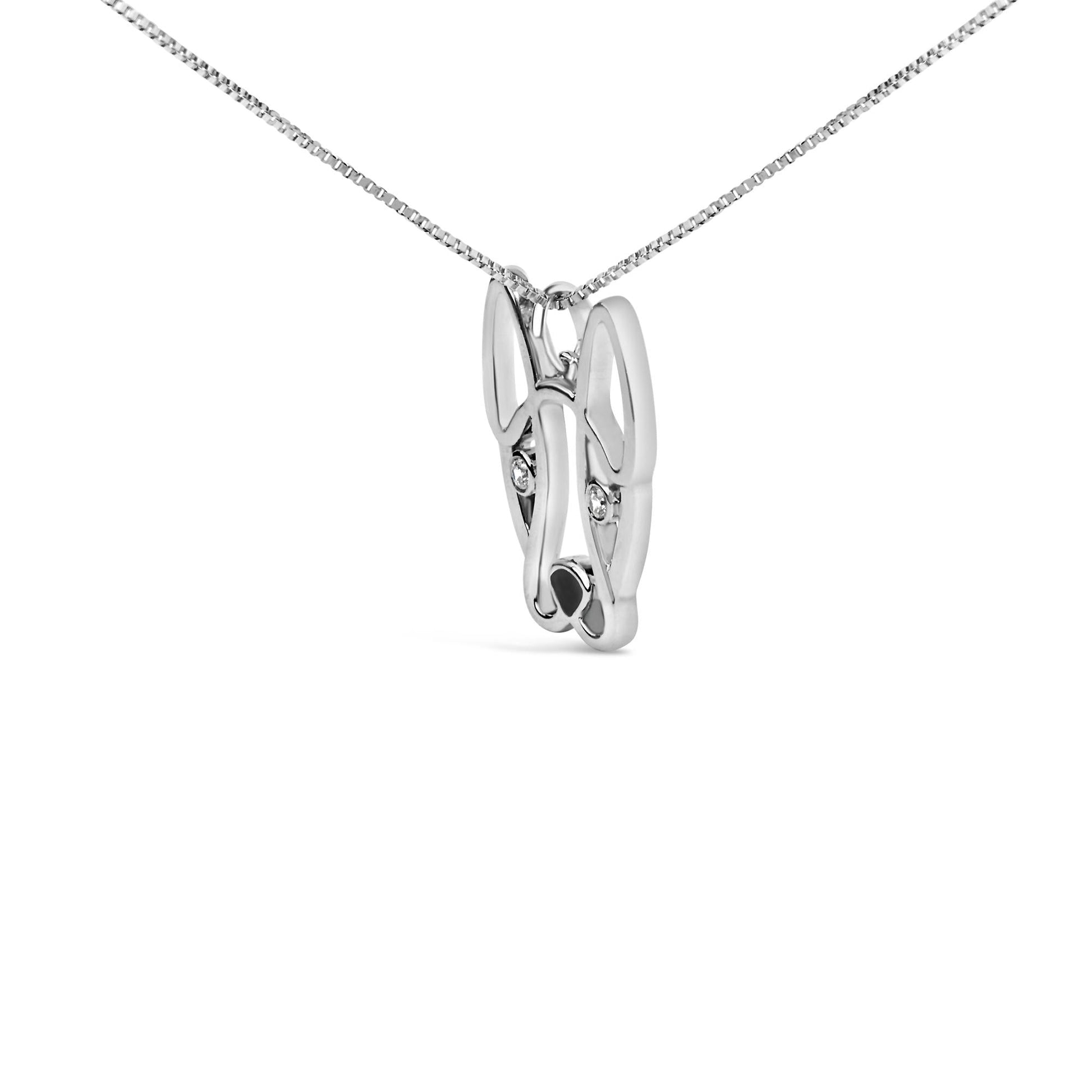 Silver necklace with a unique pendant on a white background