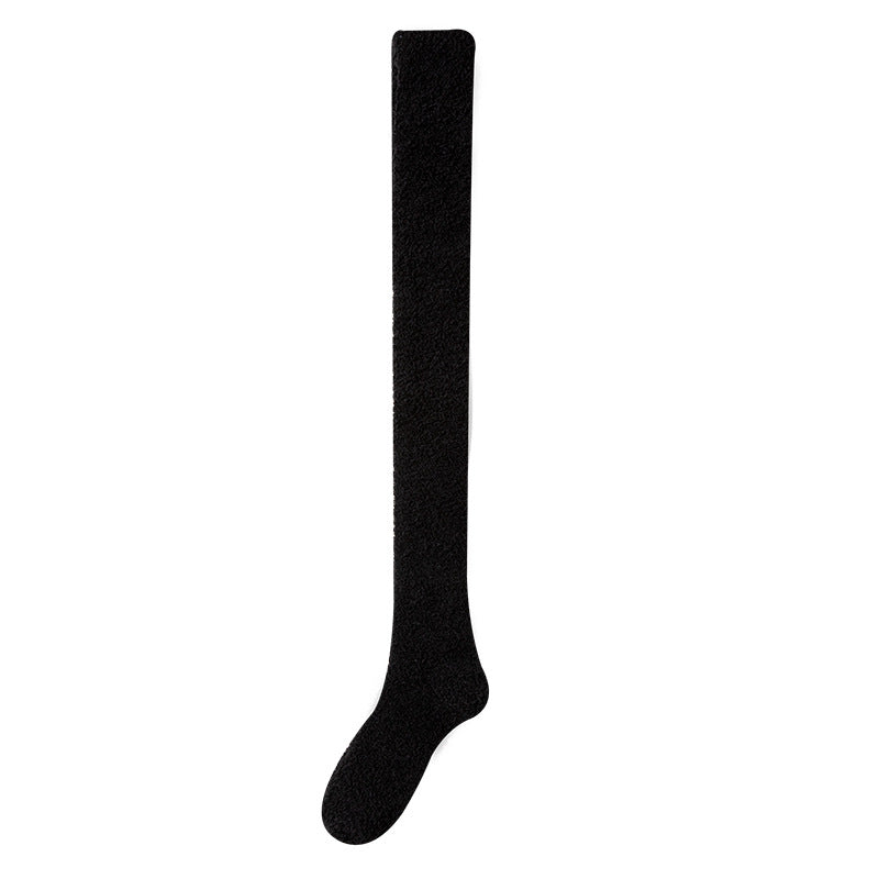 Black knee-high sock on a white background