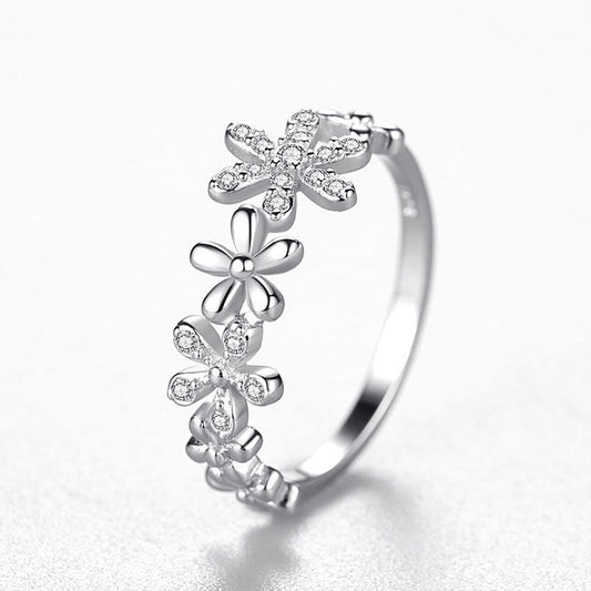 Sparkling sterling silver daisy ring adds a touch of luxury to any outfit. Delicate details and micro diamonds exude feminine charm. Perfect for adding a touch of elegance to your everyday looks