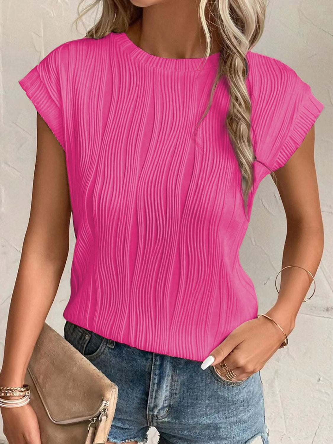 Model wearing Women's Hot Pink Textured Round Neck Cap Sleeve T-Shirt