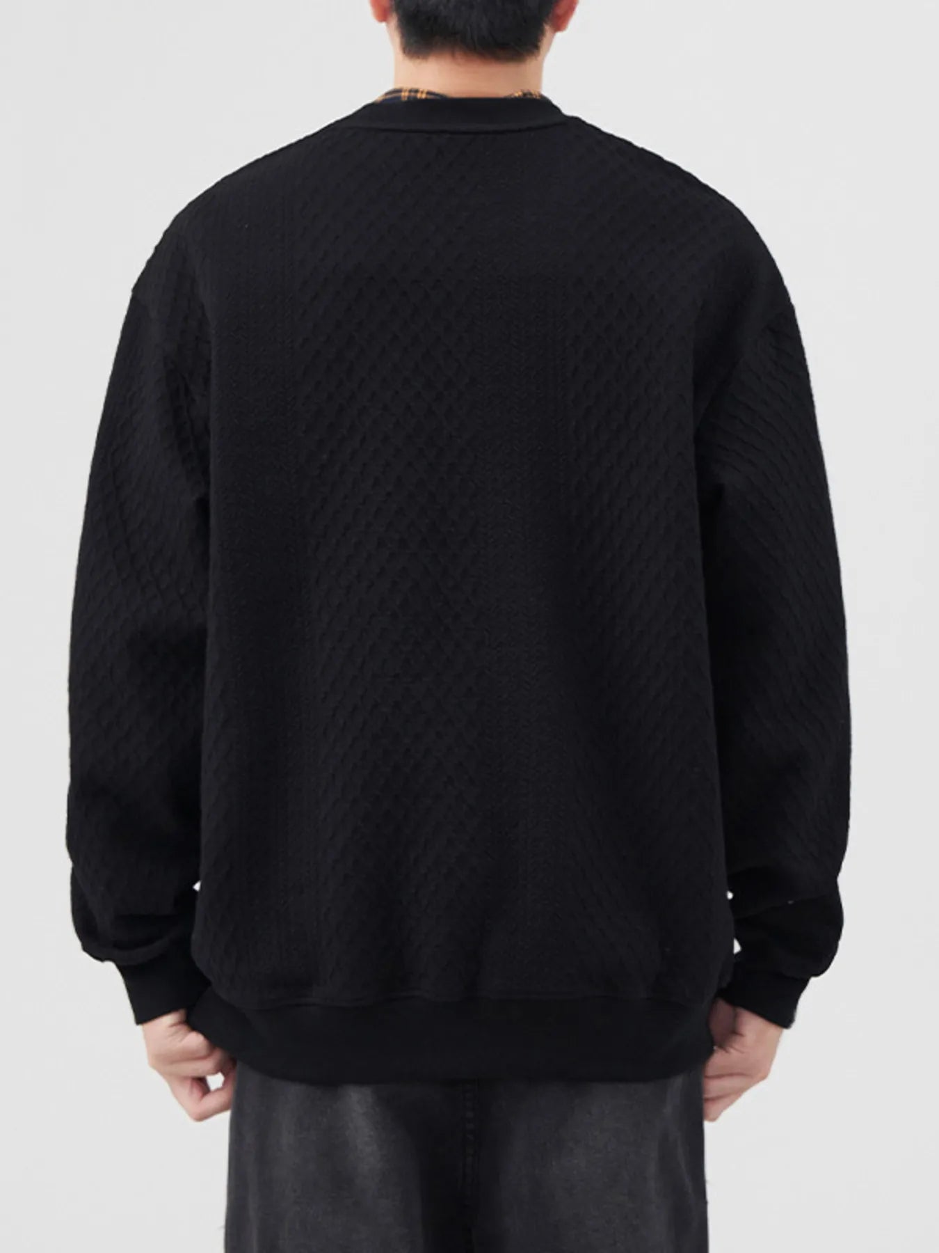 Model wearing a Men's Black Waffle Knit Sweatshirt back view