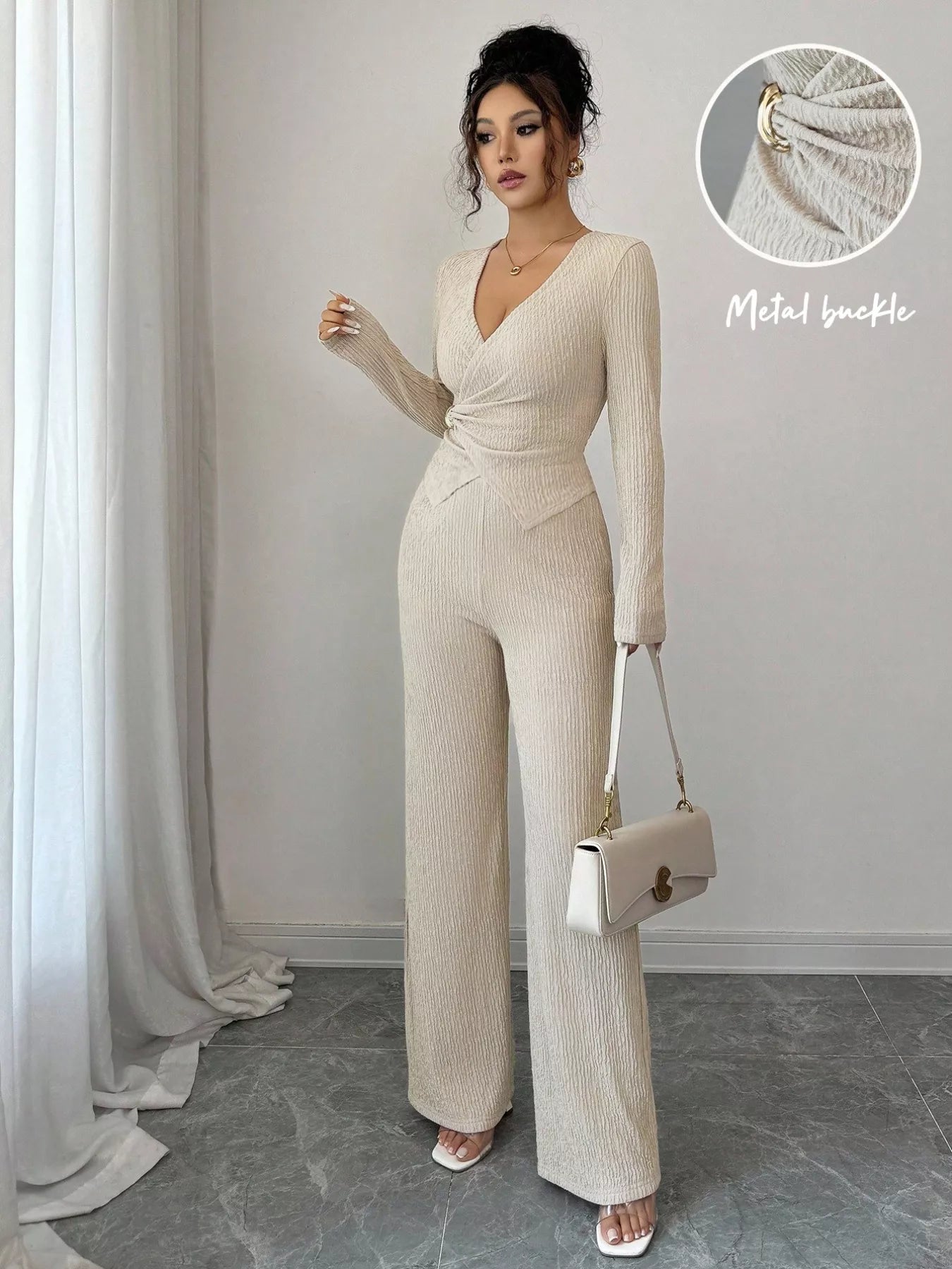 Woman wearing a beige ribbed jumpsuit with a close-up of the fabric texture on a gray background.