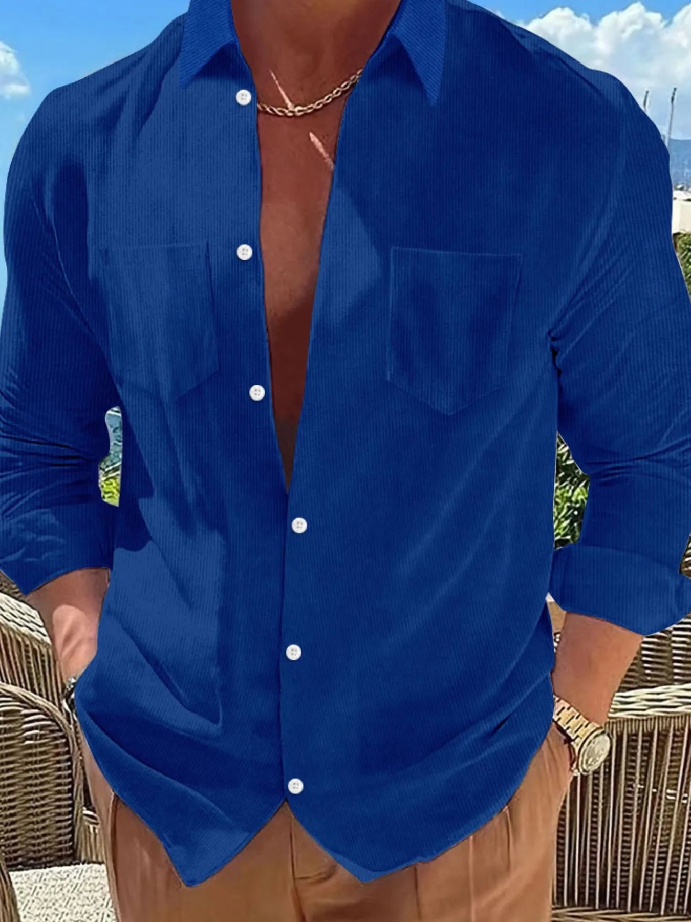 Male model wearing a royal blue ribbed Button Down Long Sleeve Casual Shirt 