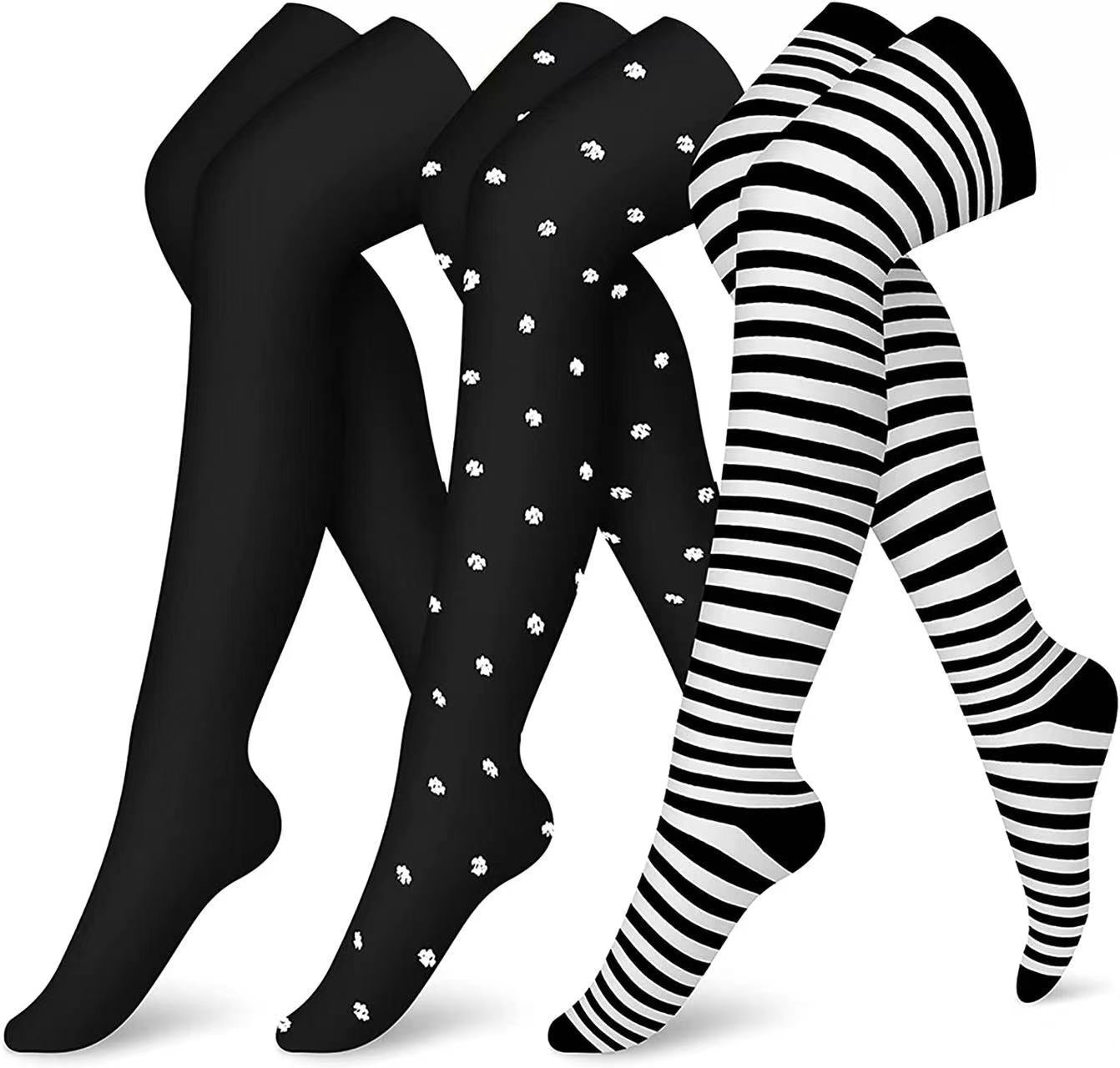Four pairs of tights in black, black with white polka dots, and black and white striped patterns on a white background.