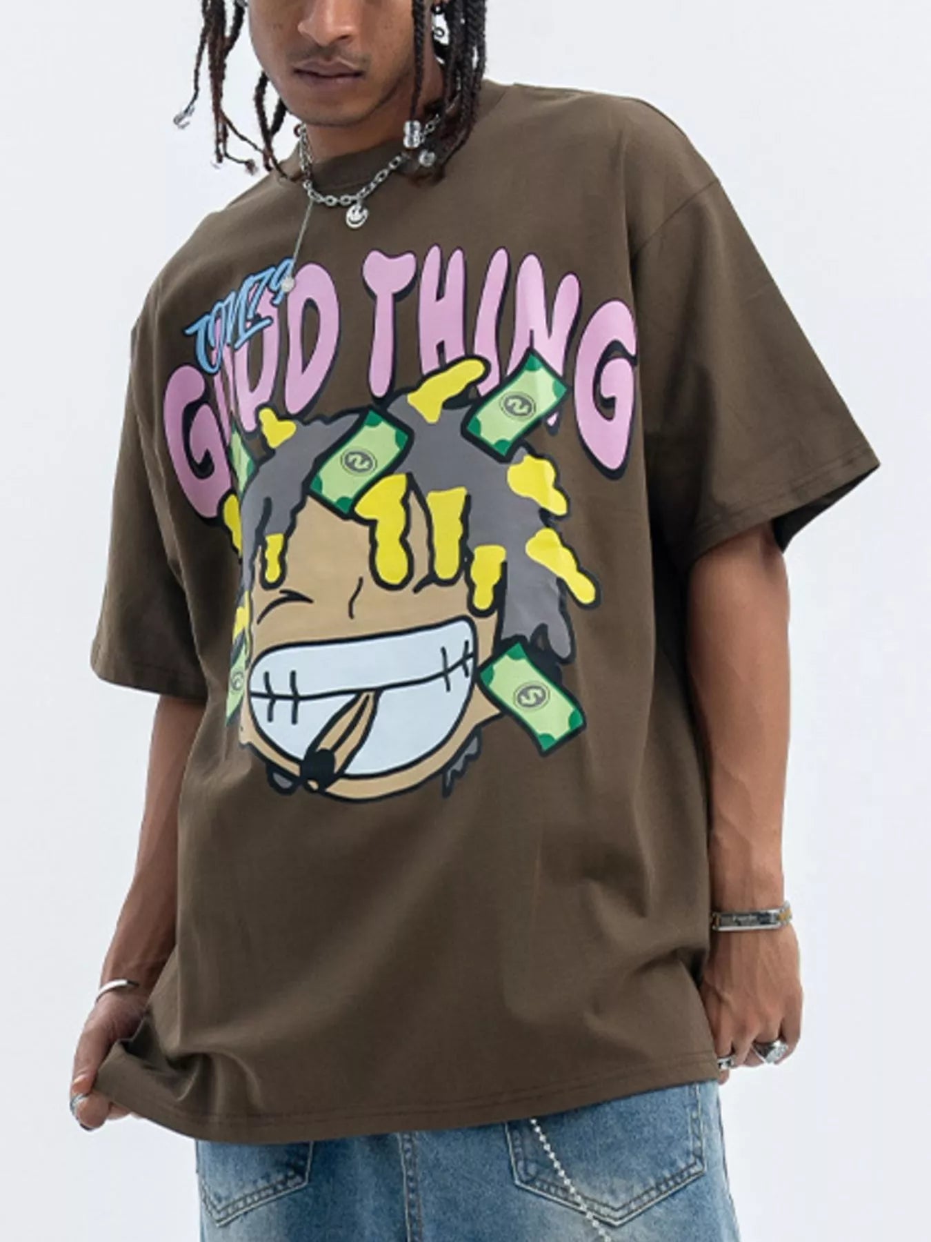 Model wearing a brown fierceguy "Good Thing" graphic t-shirt