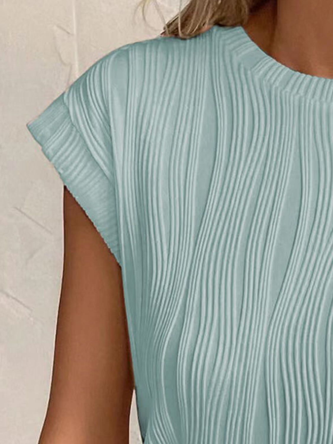 Close-up of textured fabric on Women's Sage Round Neck Cap Sleeve T-Shirt