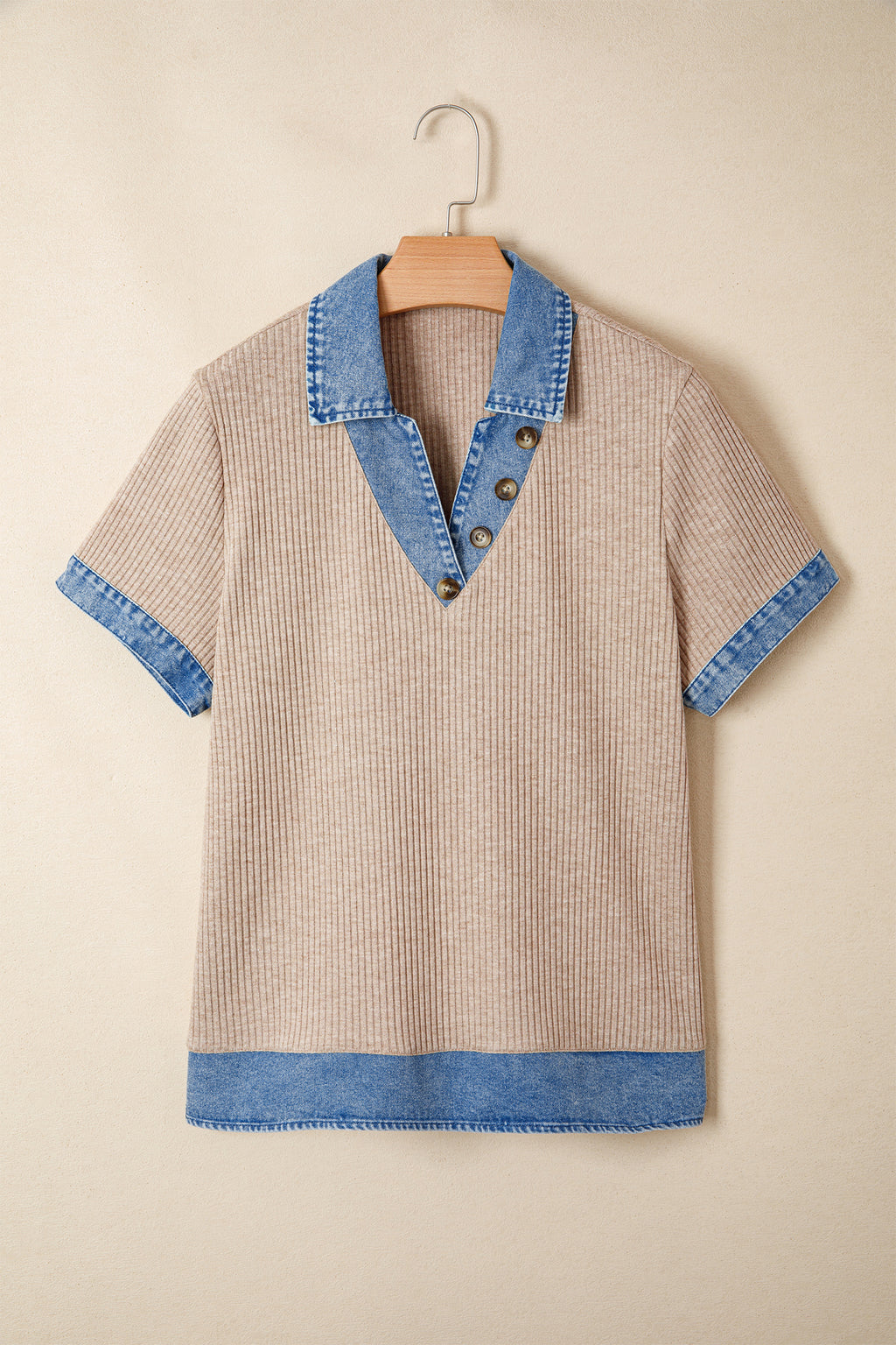 Beige dress with blue accents on a beige background