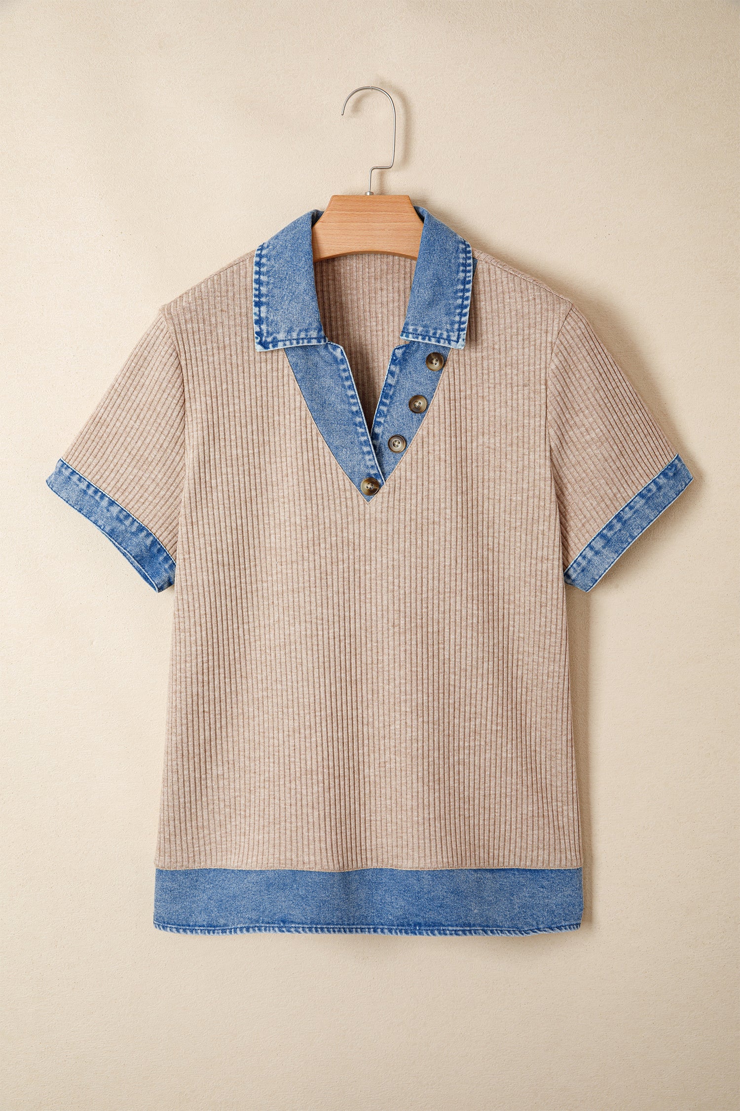 Beige dress with blue accents on a beige background