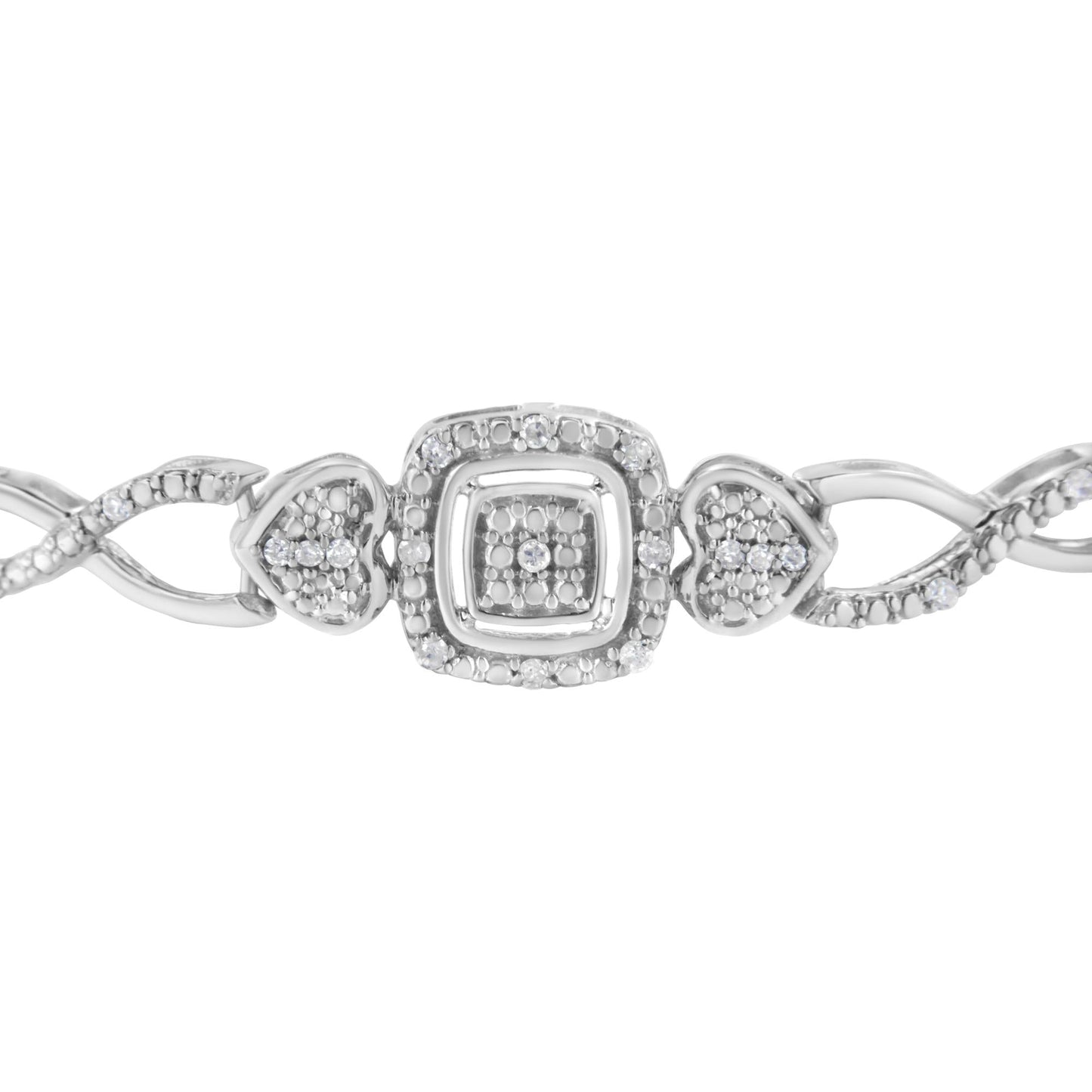 Silver bracelet with a central square design on a white background