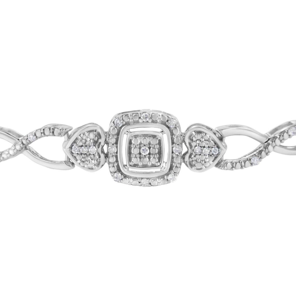 Silver bracelet with a central square design on a white background