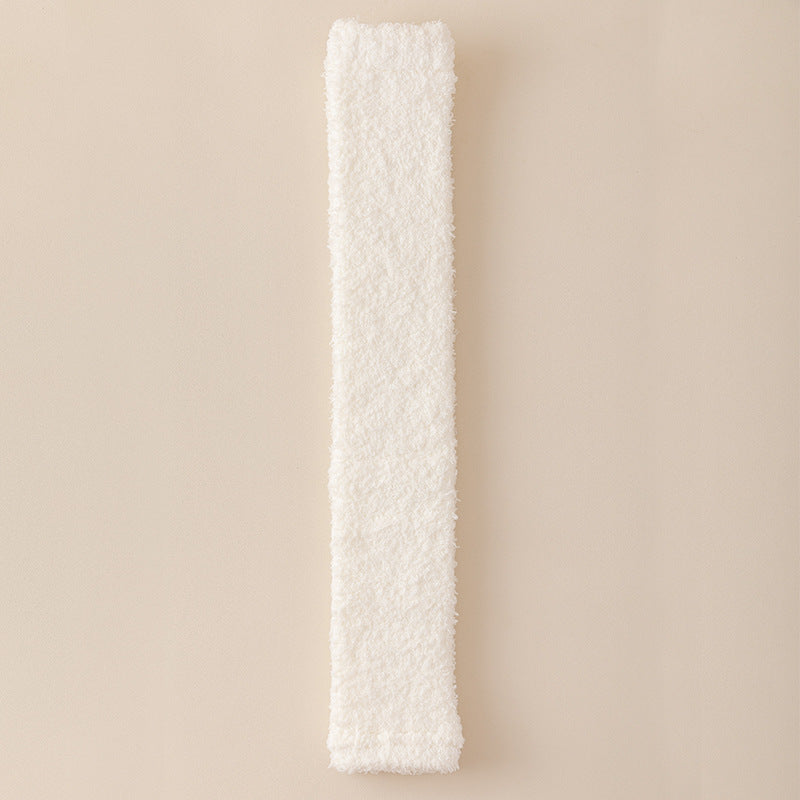 White rectangular object on a beige background
