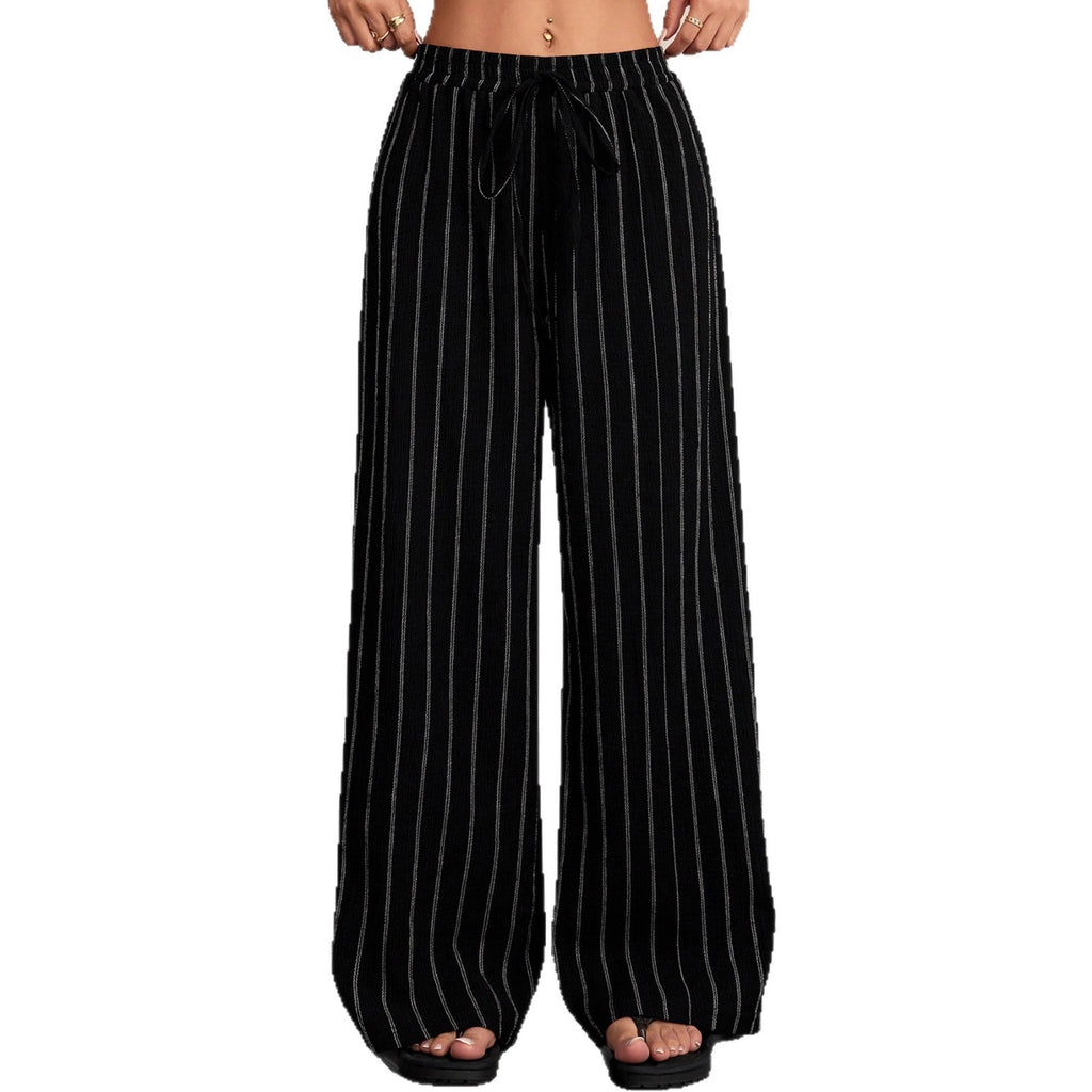 Black and white striped pants on a white background
