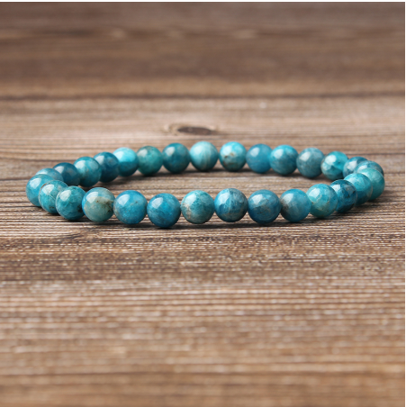 Enjoy the calming properties of our Natural Blue Apatite Unisex Bracelet. Made from genuine blue apatite stones, this bracelet promotes harmony and balance in your life. With its versatile design, it's perfect for both men and women. Add this bracelet to your collection for a touch of natural beauty and energy.