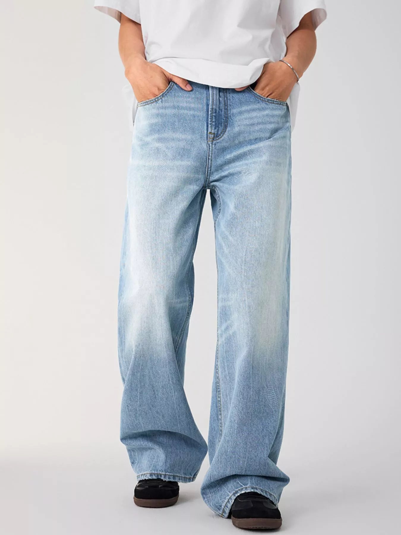 Model wearing Men's Wash Relaxed Fit Long Leg Jeans