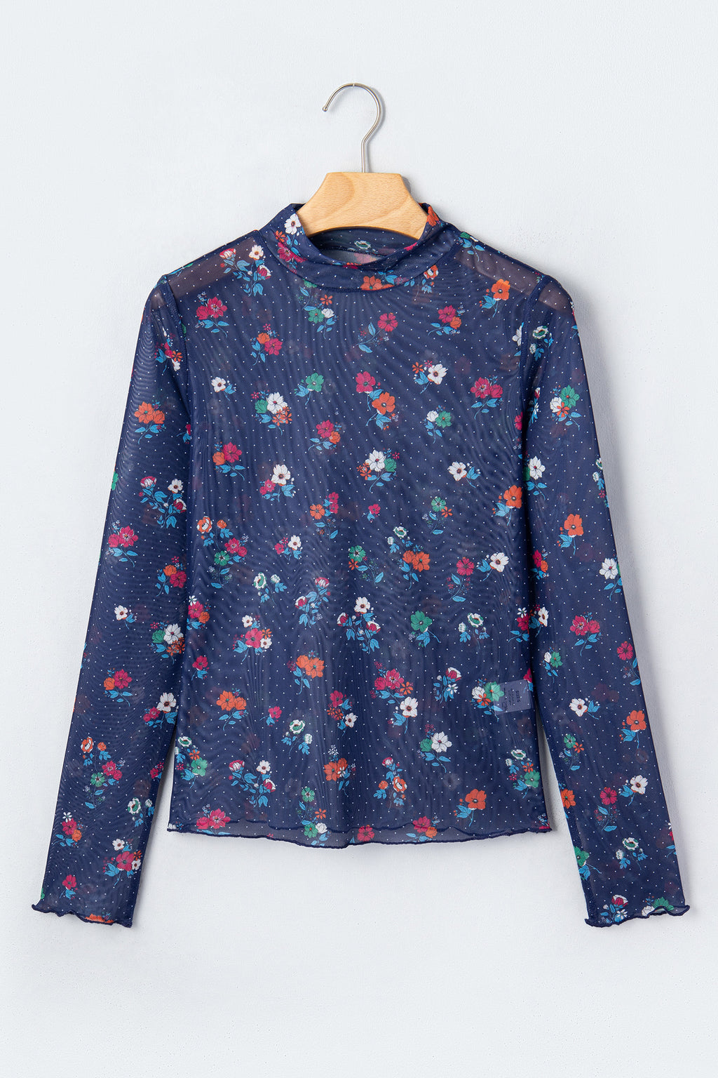 Chic Women's Blue Polka Dot Floral Sheath Top on a hanger front view