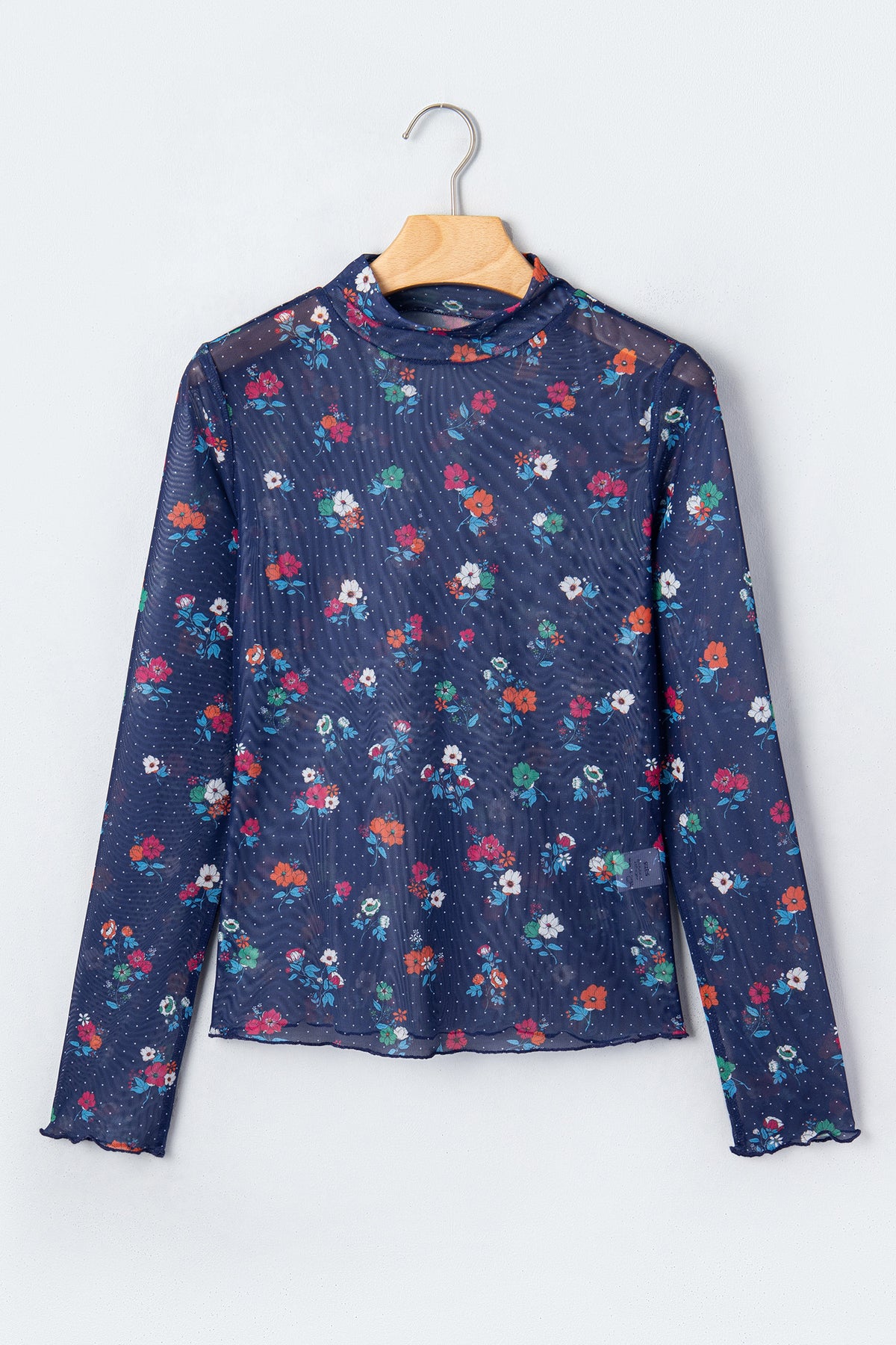 Chic Women's Blue Polka Dot Floral Sheath Top on a hanger front view