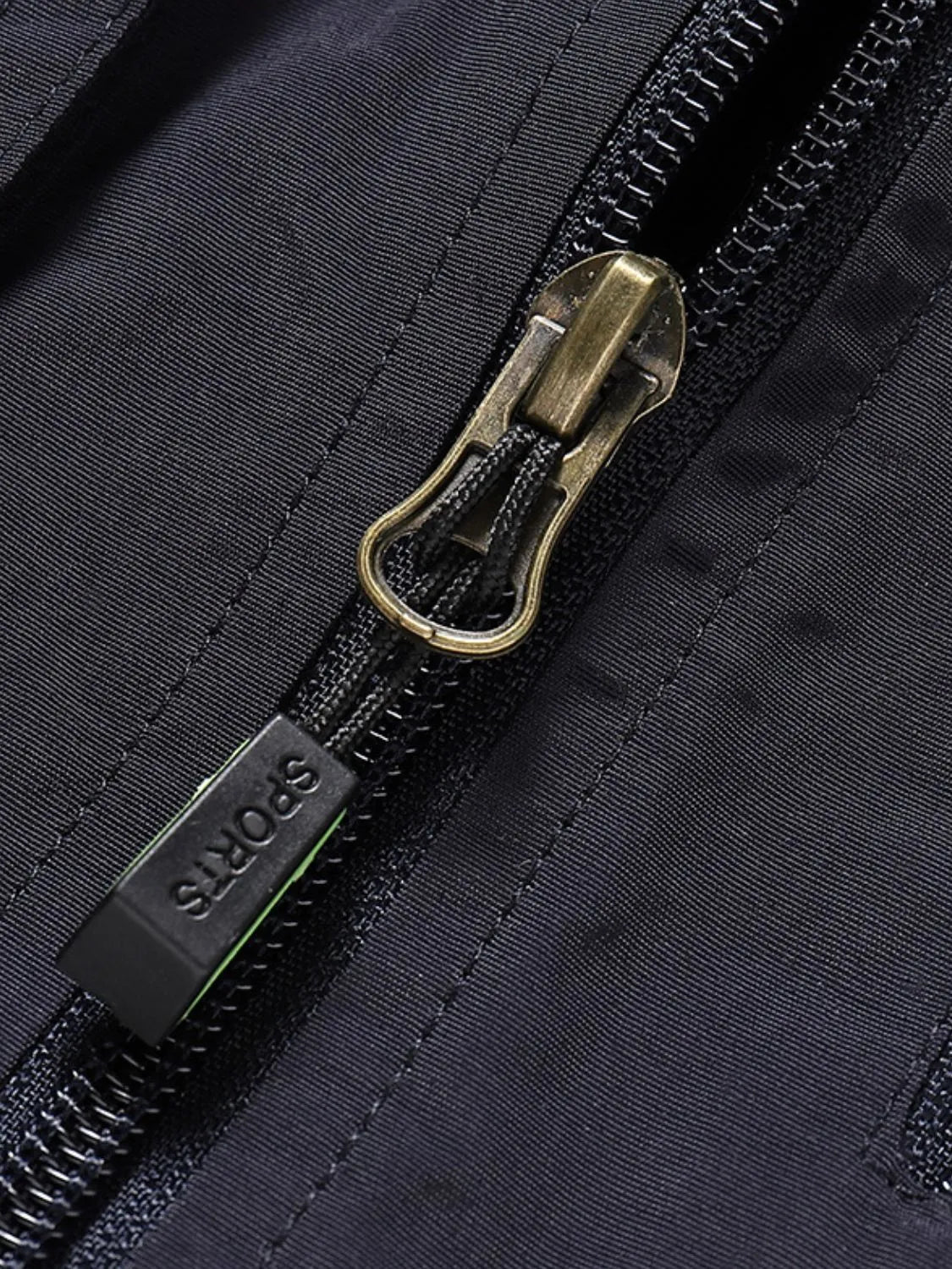 Zipper close up on a Men's Fisherman Style Zip Up Vest with Pockets