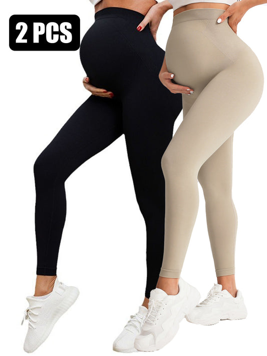 Two pairs of leggings, one black and one beige, worn by models on a white background.