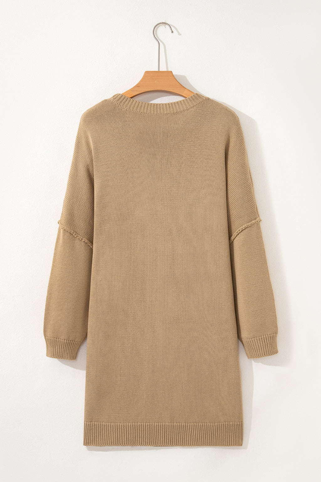 Women's Khaki Exposed Seam Mini Sweater Dress on a hanger back view