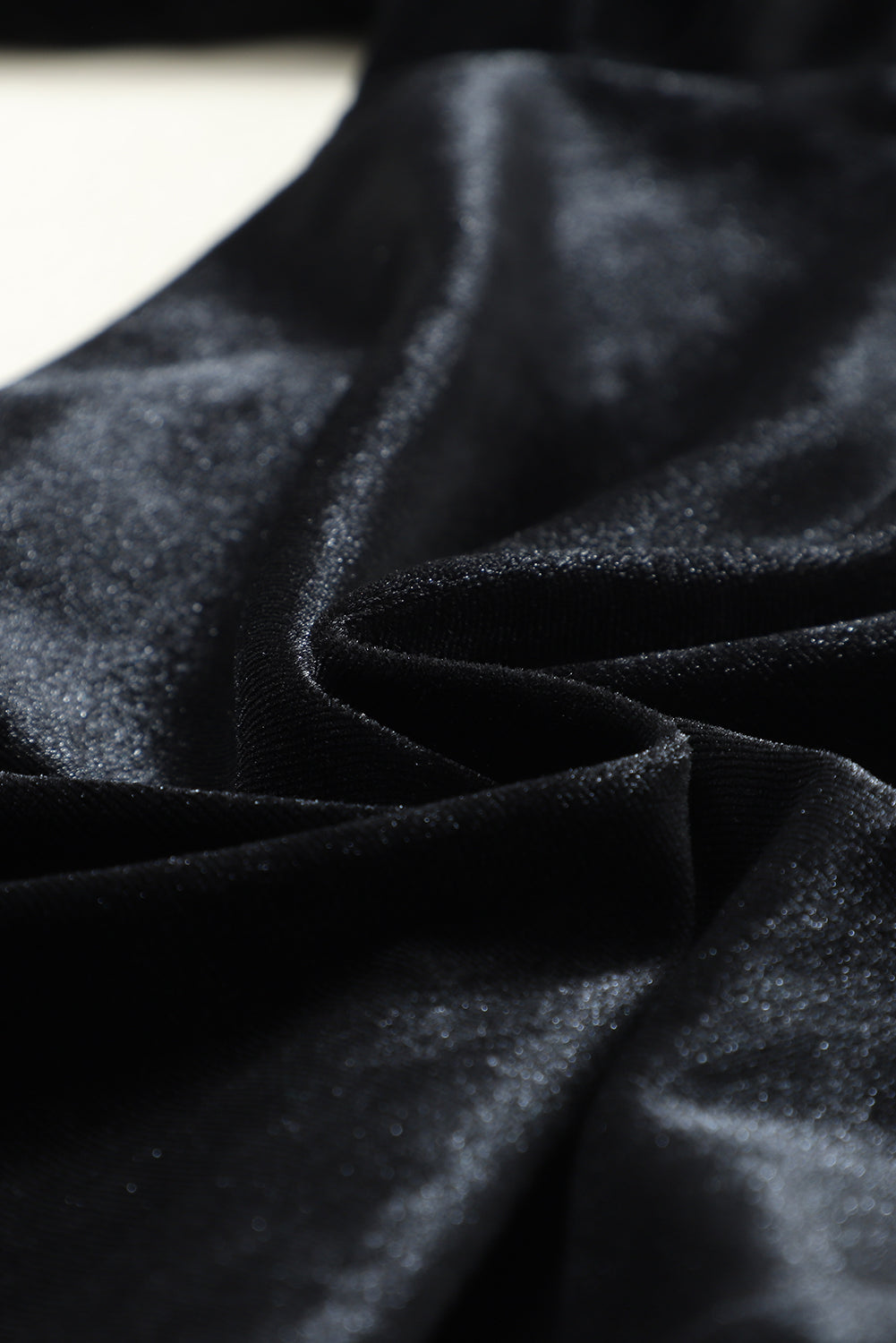 Close-up of dark fabric with folds