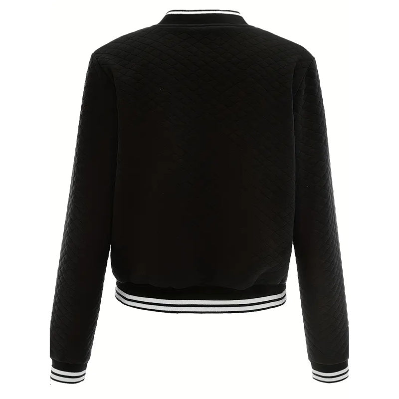 Black quilted jacket with white trim on a white background