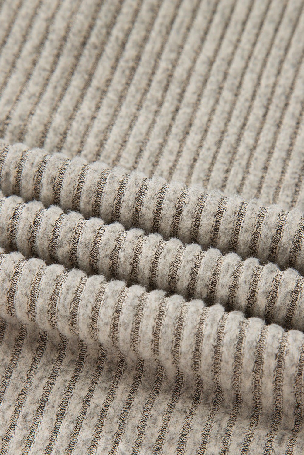 Close-up of textured fabric with ribbed pattern