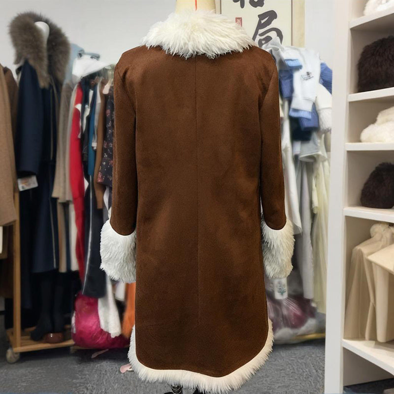 Brown coat with white fur trim in a clothing store setting