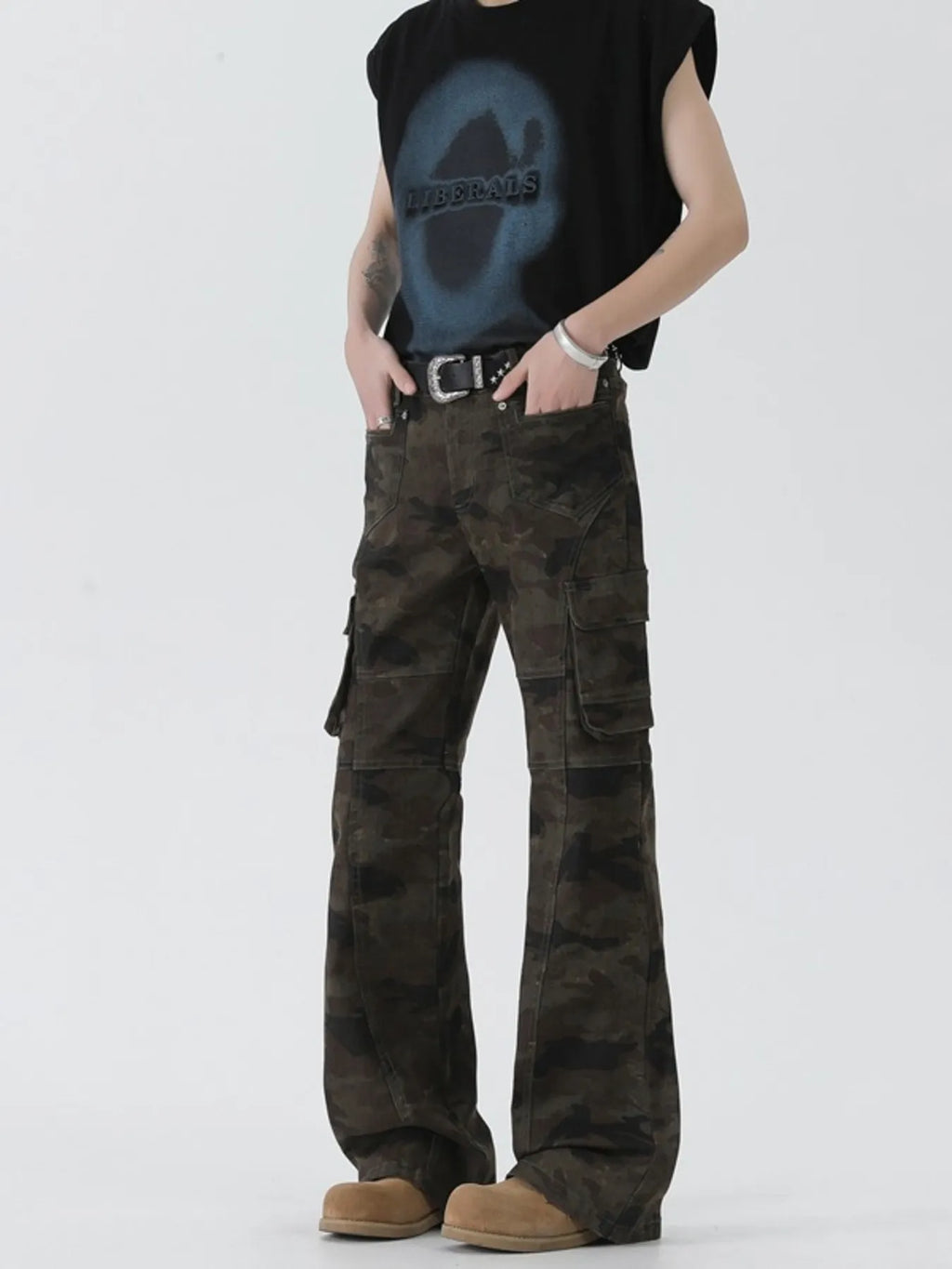 Model wearing Men's Camo Cargo Flare Jeans front angle view