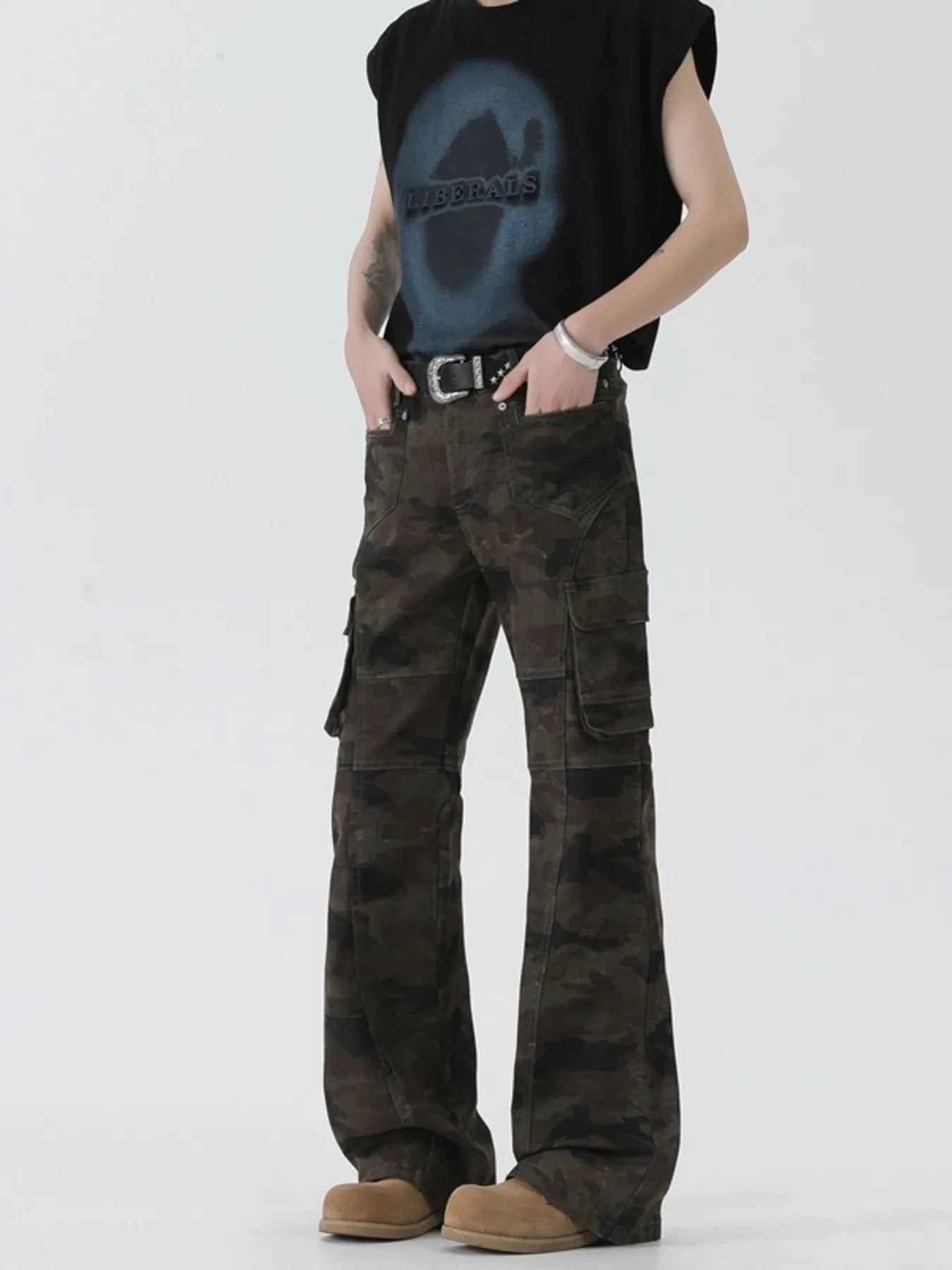 Model wearing Men's Camo Cargo Flare Jeans front angle view