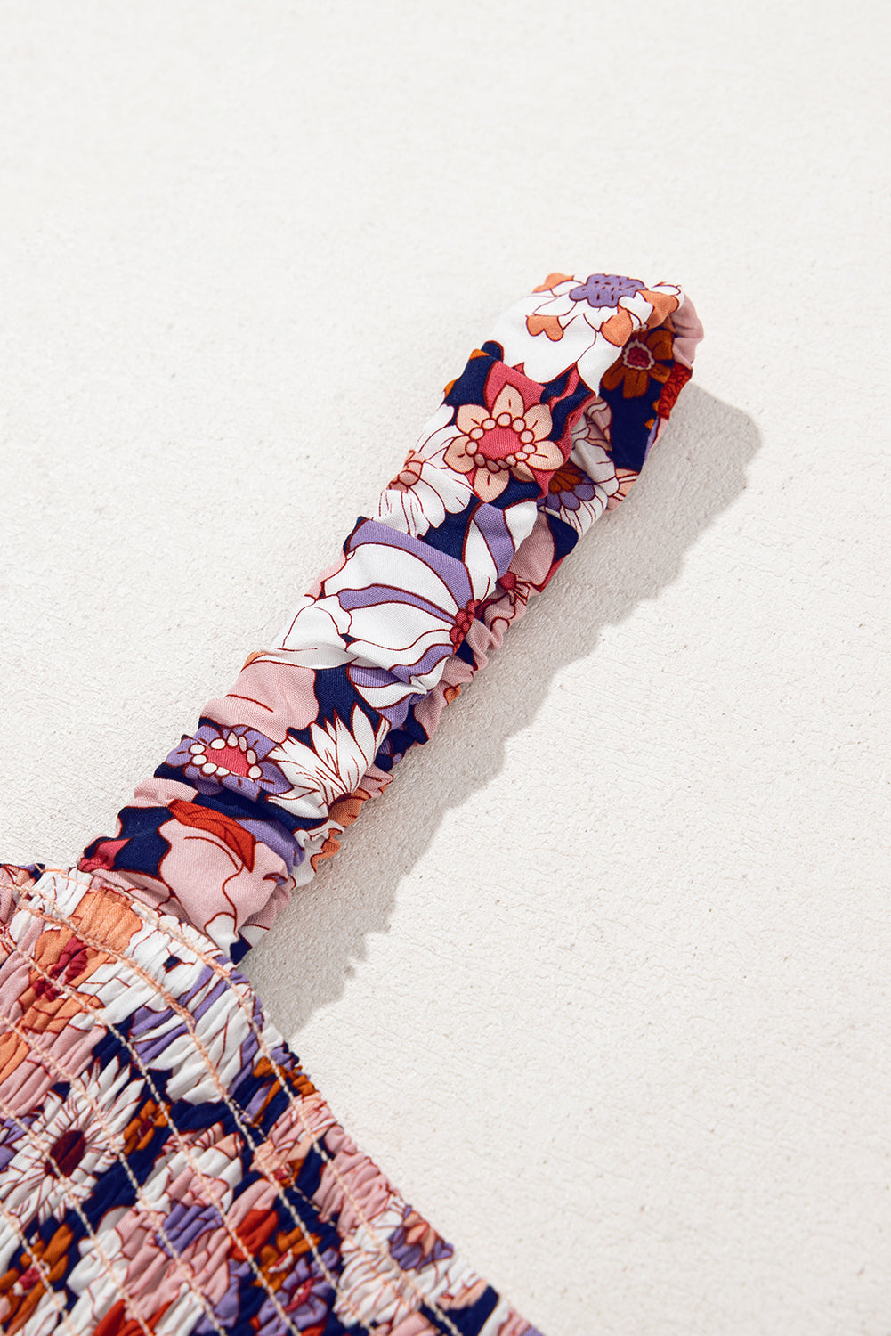 Floral peach patterned headband on a white background