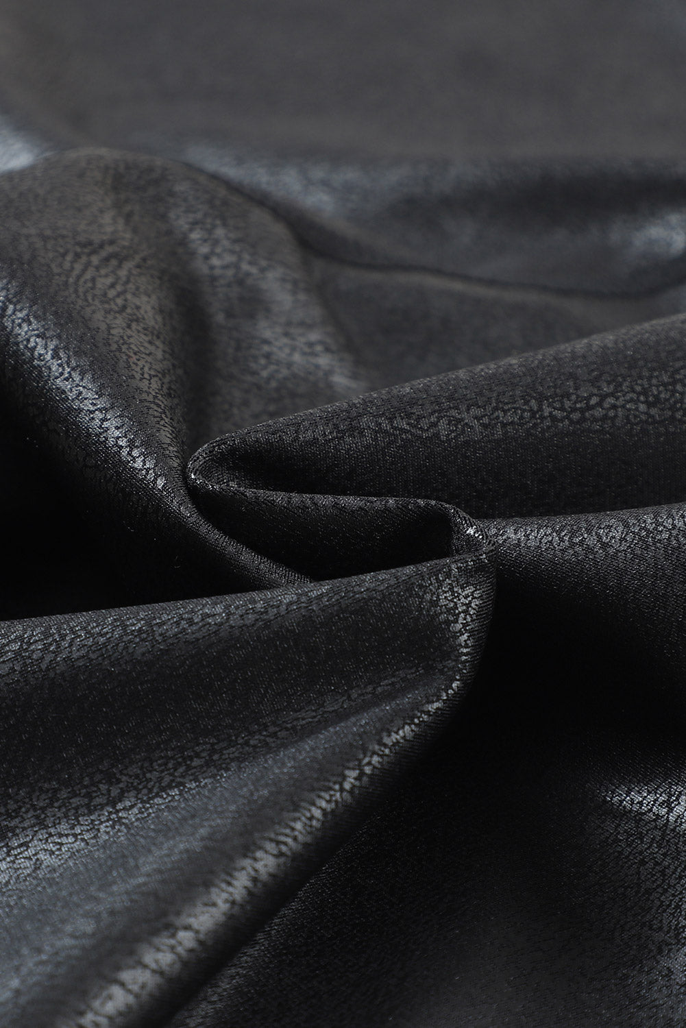 Close-up of black leather texture