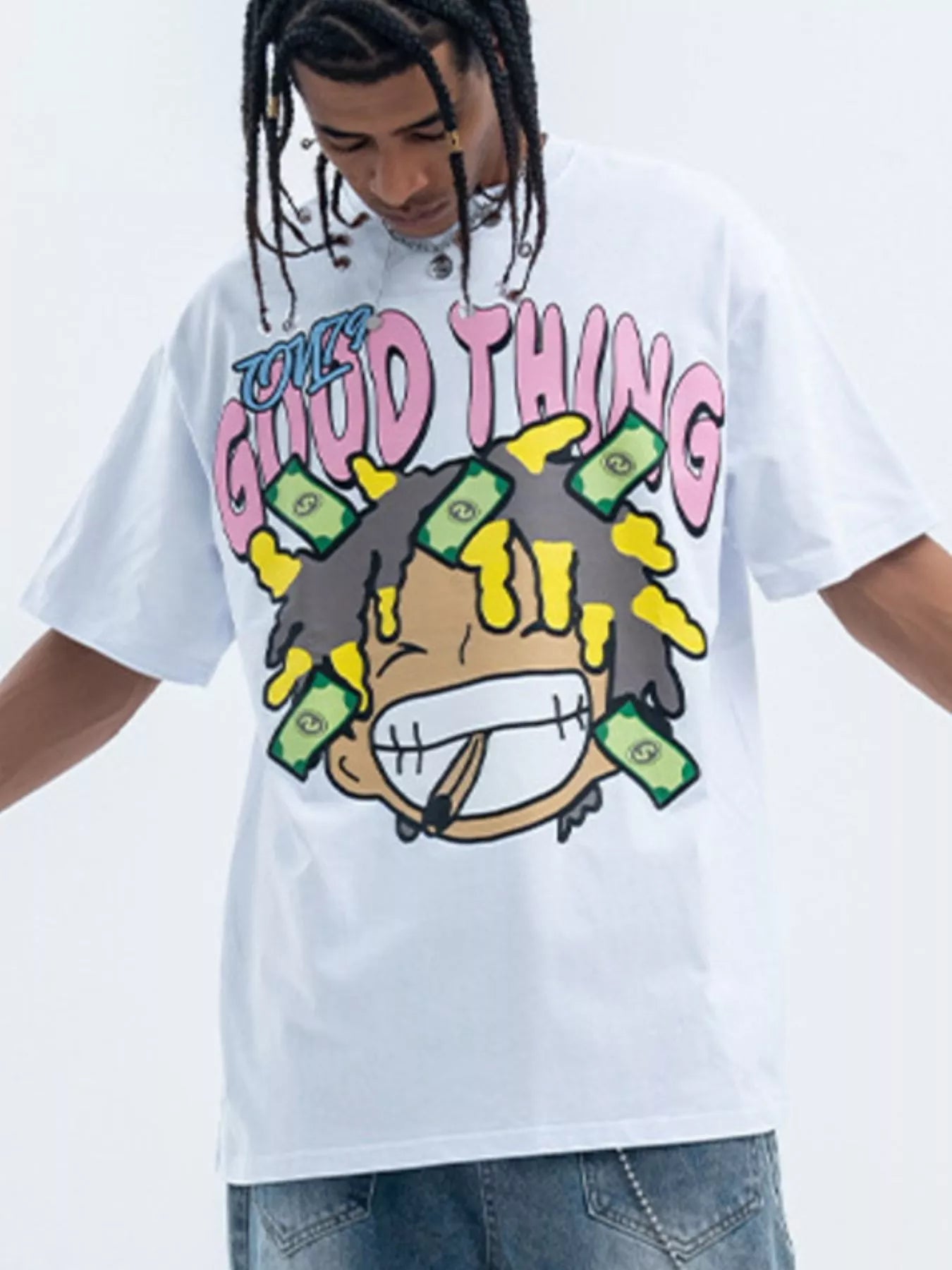Model wearing a white fierceguy "Good Thing" graphic t-shirt