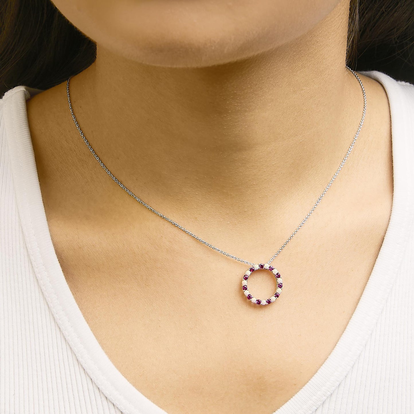 Unveiling Luxury: .925 Sterling Silver's Ruby & Opal Extravagance