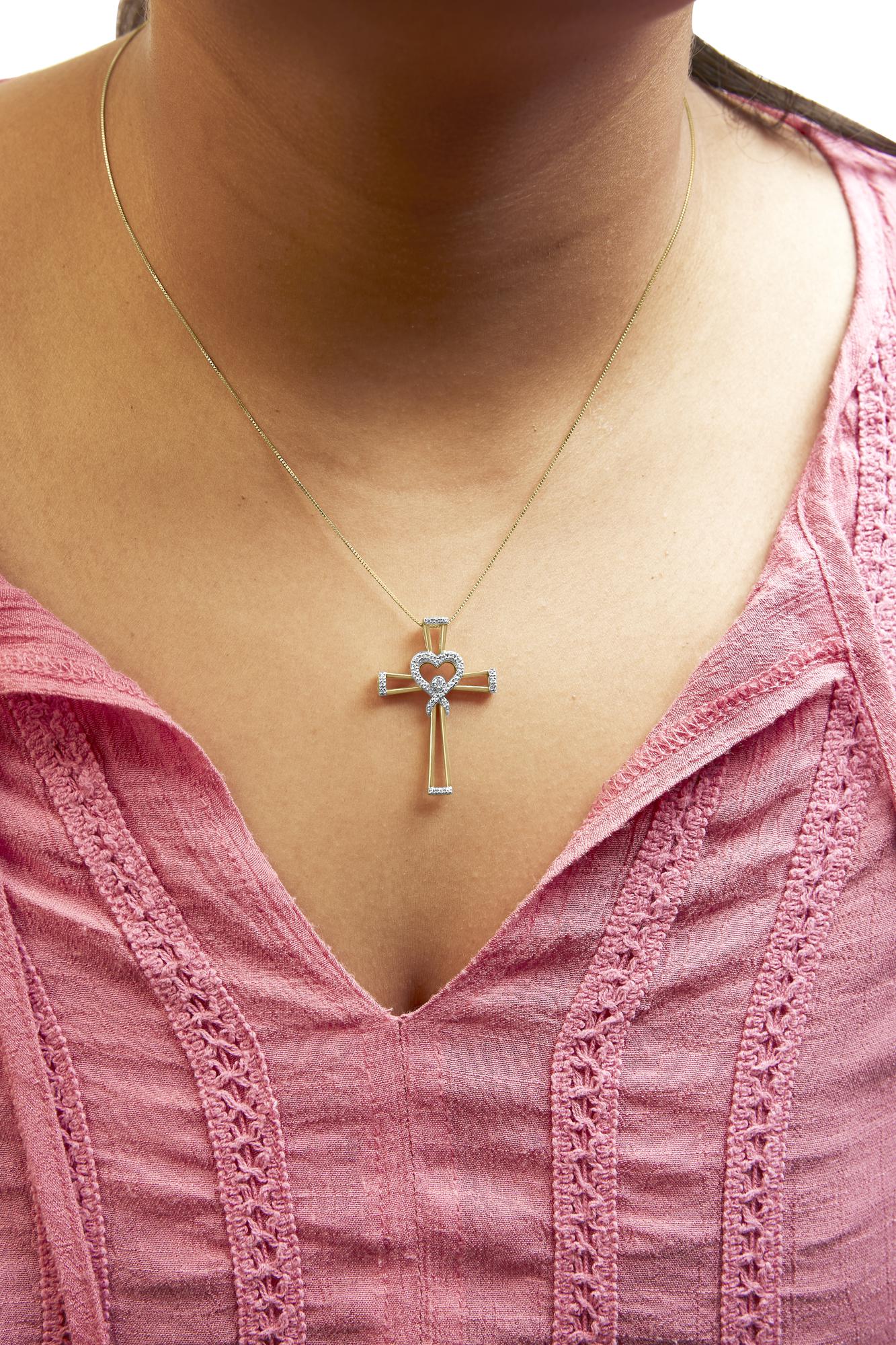 14K Yellow Gold Plated .925 Sterling Silver 1/6 Cttw Diamond Interlocking Heart and Ribbon Cross Pendant Necklace (H-I Color, I2-I3 Clarity) - 18in