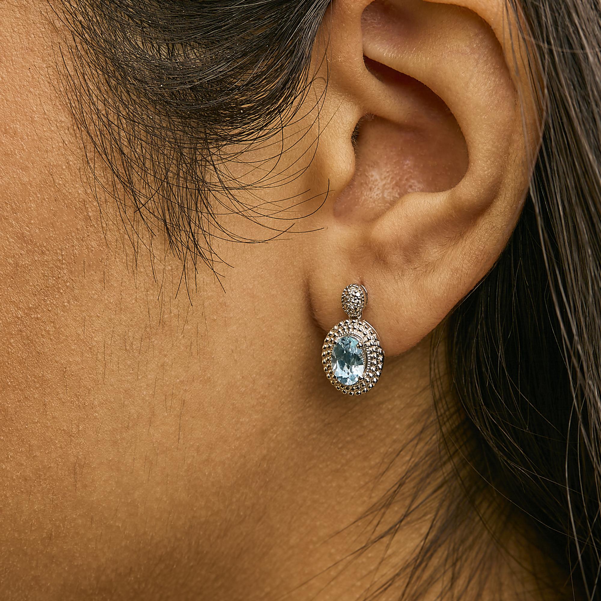 Elevate Your Style with Rhodium-Plated Sterling Silver Blue Topaz Earrings