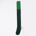 Green knee-high sock on a white background