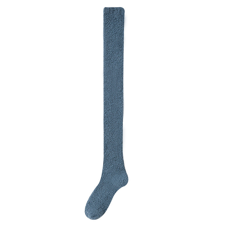 Blue knee-high sock on a white background