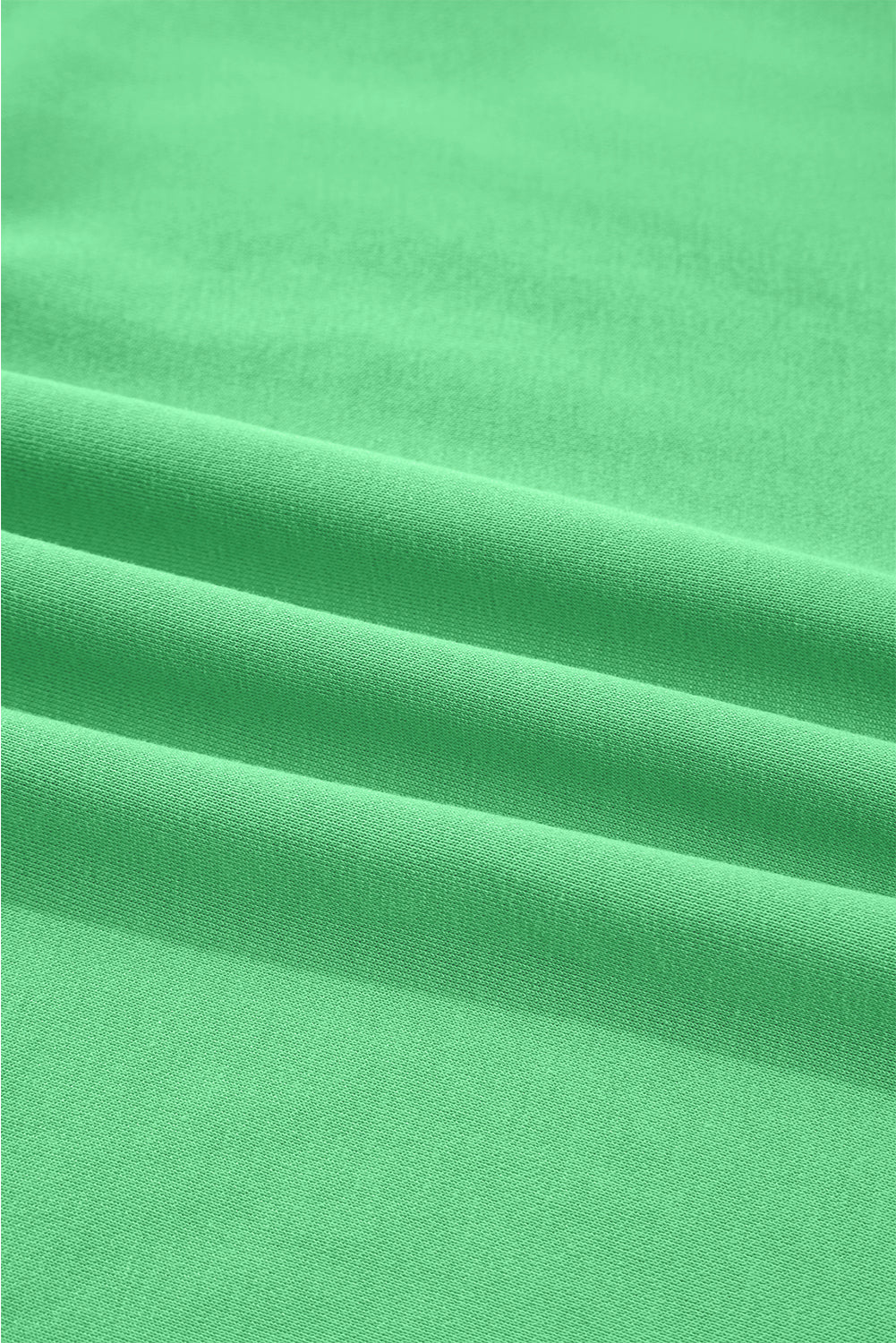 Close-up of green fabric with visible texture