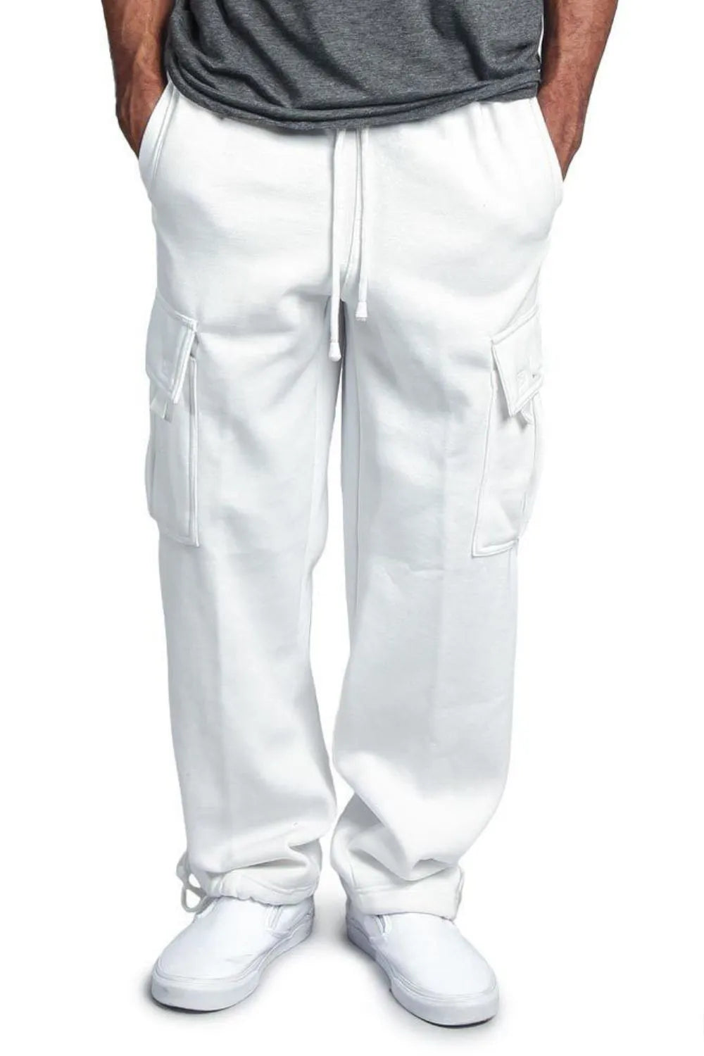 Male model wearing a pair of white casual draw string cargo joggers pants 