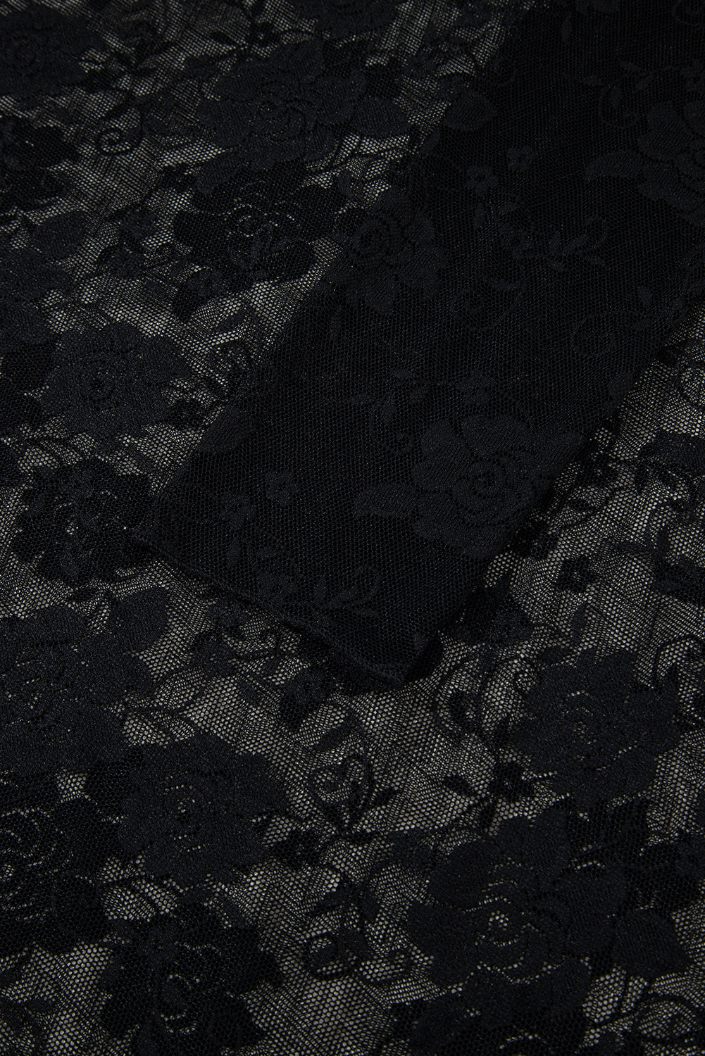 Black lace fabric with floral patterns