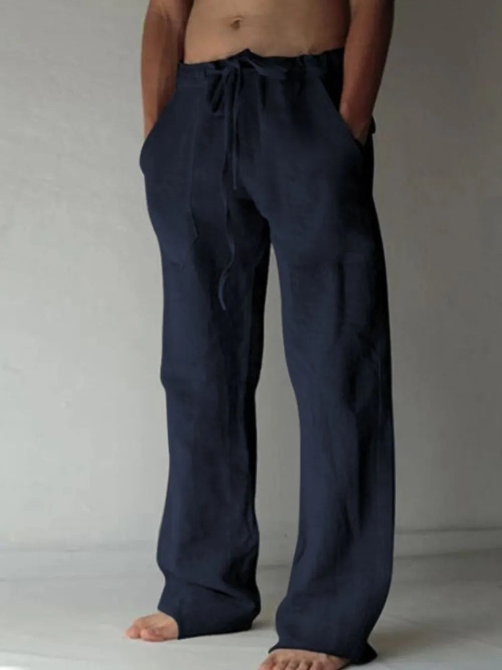 Navy blue linen Drawstring Loose Fit Pants  worn by a male model