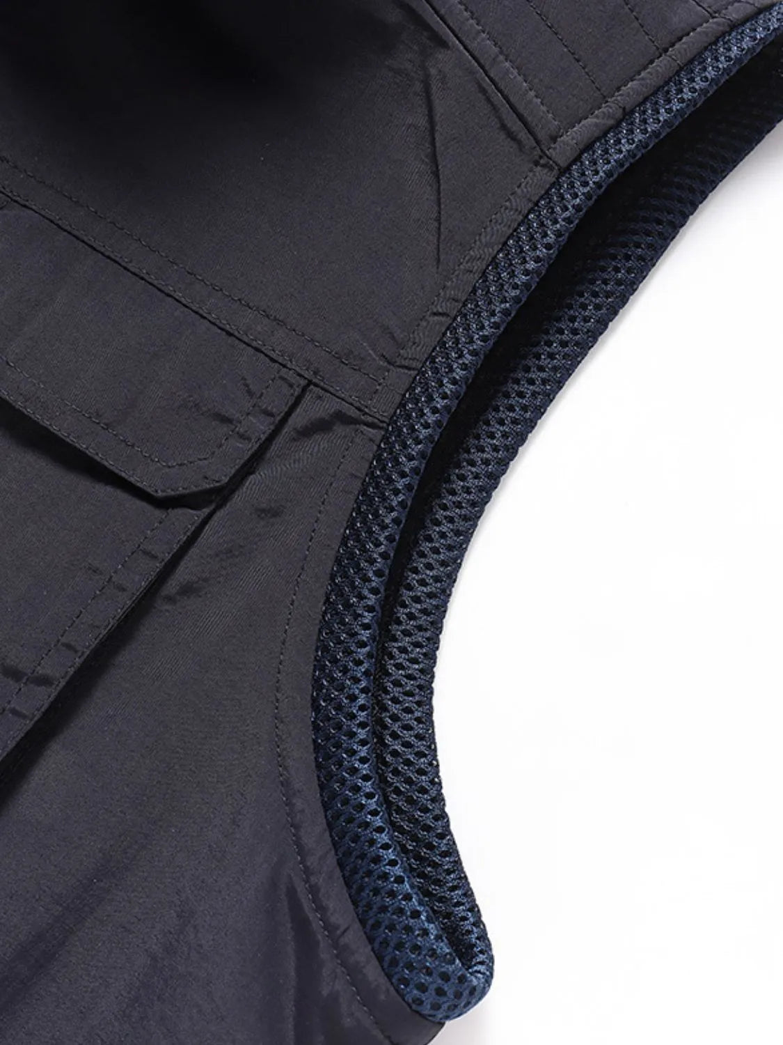 Close up a Men's Fisherman Style Zip Up Vest arm opening