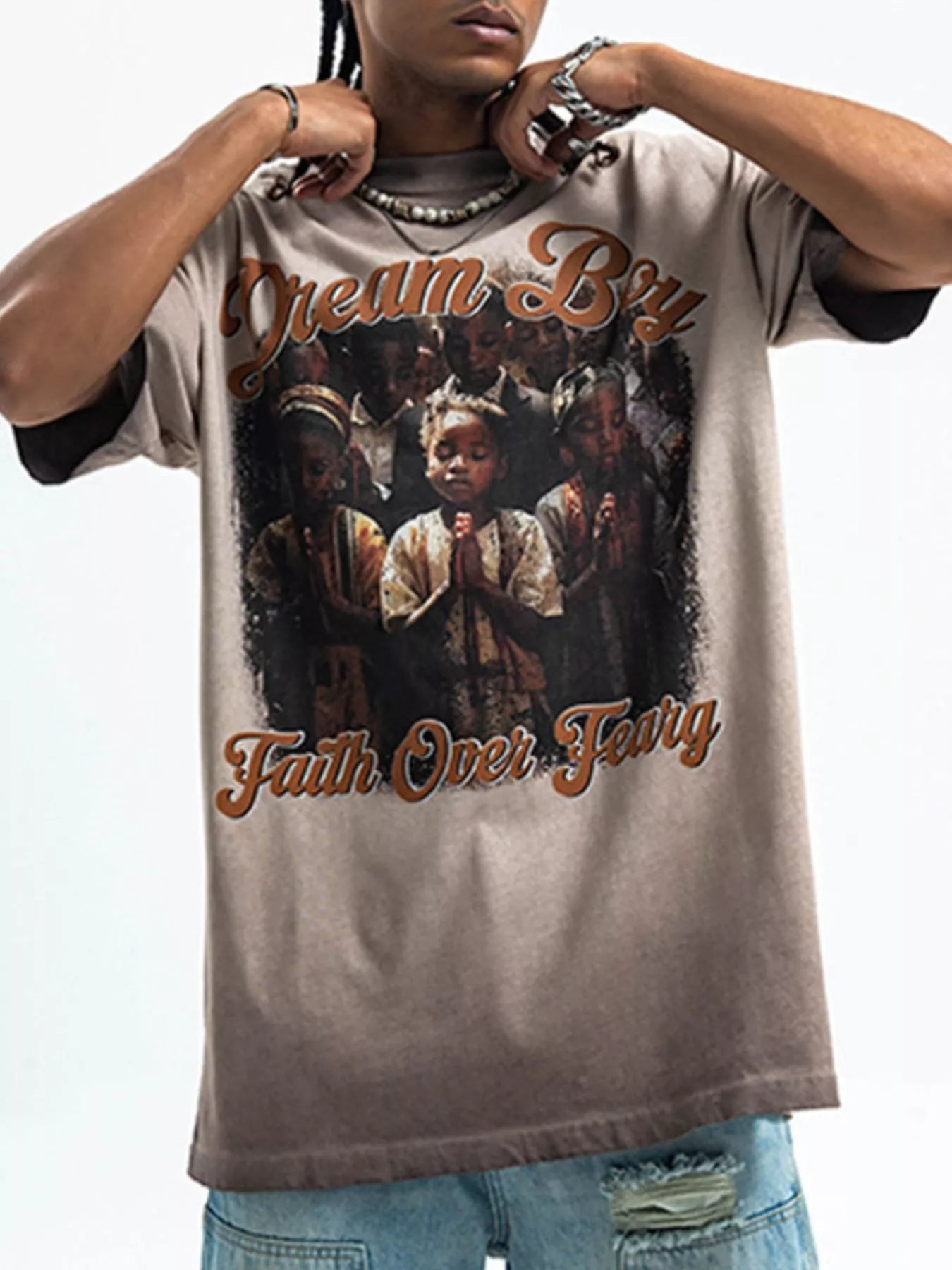 Model wear a Men's "Dream Boy Faith over Fear" Graphic khaki  T-Shirt front view