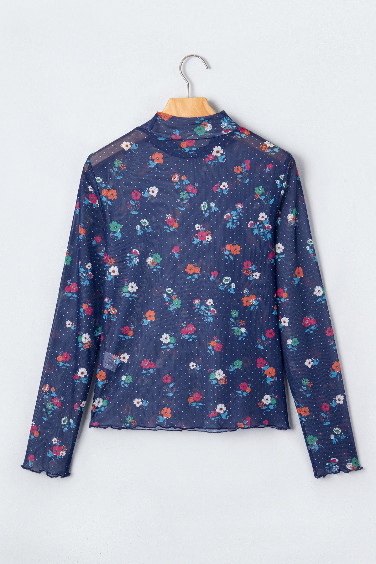 Chic Women's Blue Polka Dot Floral Sheath Top on a hanger back view