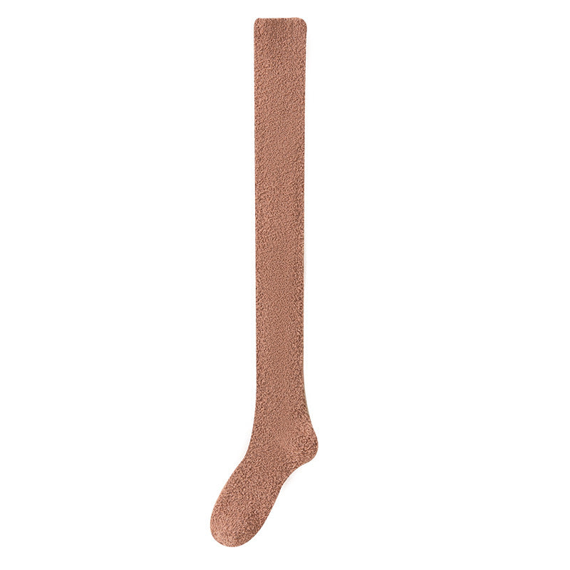 Brown knee-high sock on a white background