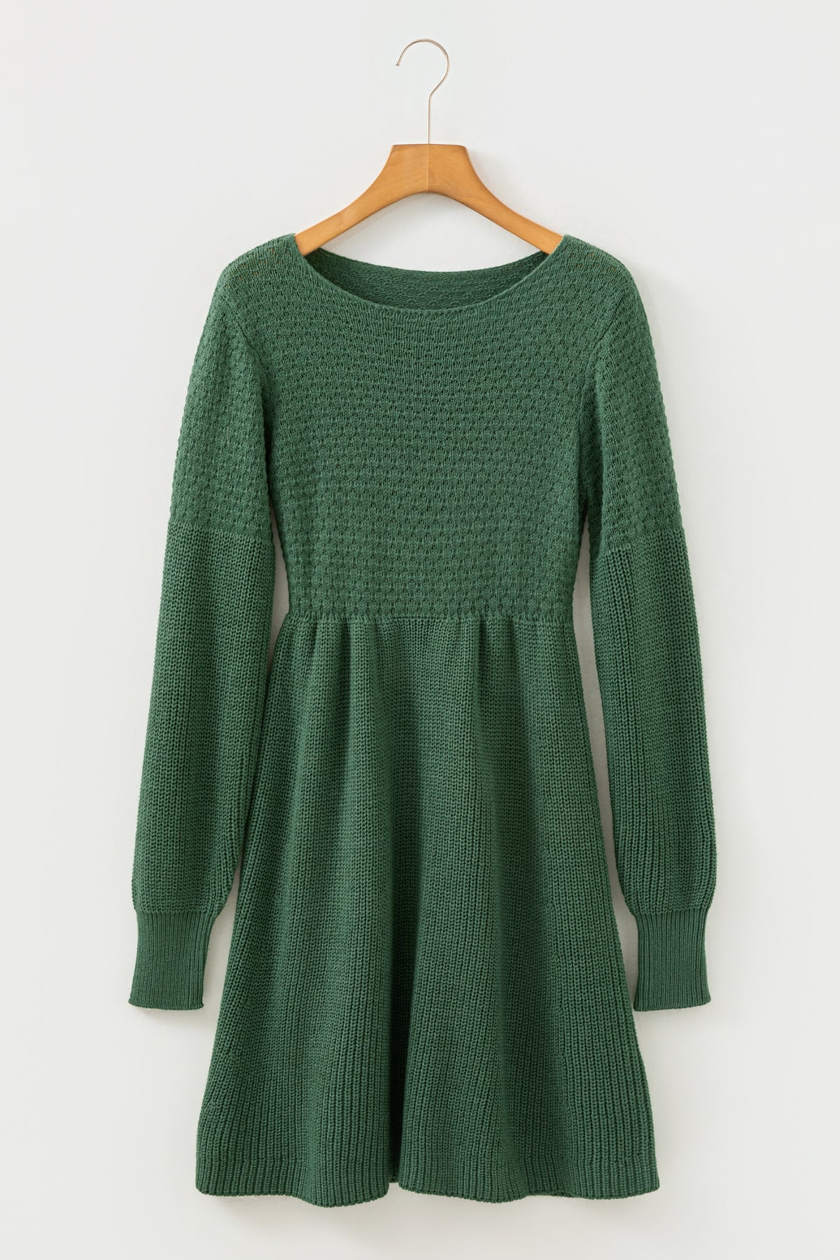 Mist Green Empire Waist Lantern Sleeve Sweater Dress on a wooden hanger front view