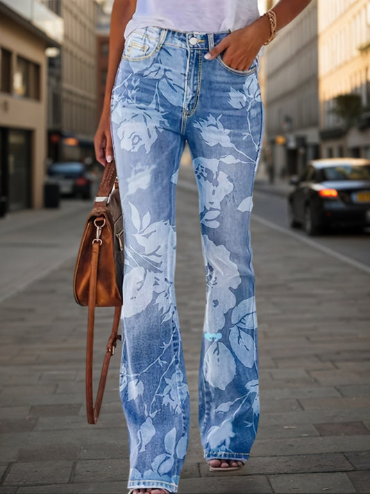 Person wearing blue floral jeans walking on a city street.