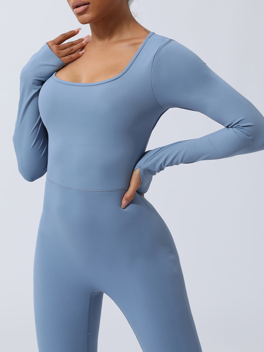 Trendy Women's Light Blue Twisted Backless Long Sleeve Jumpsuit-front view