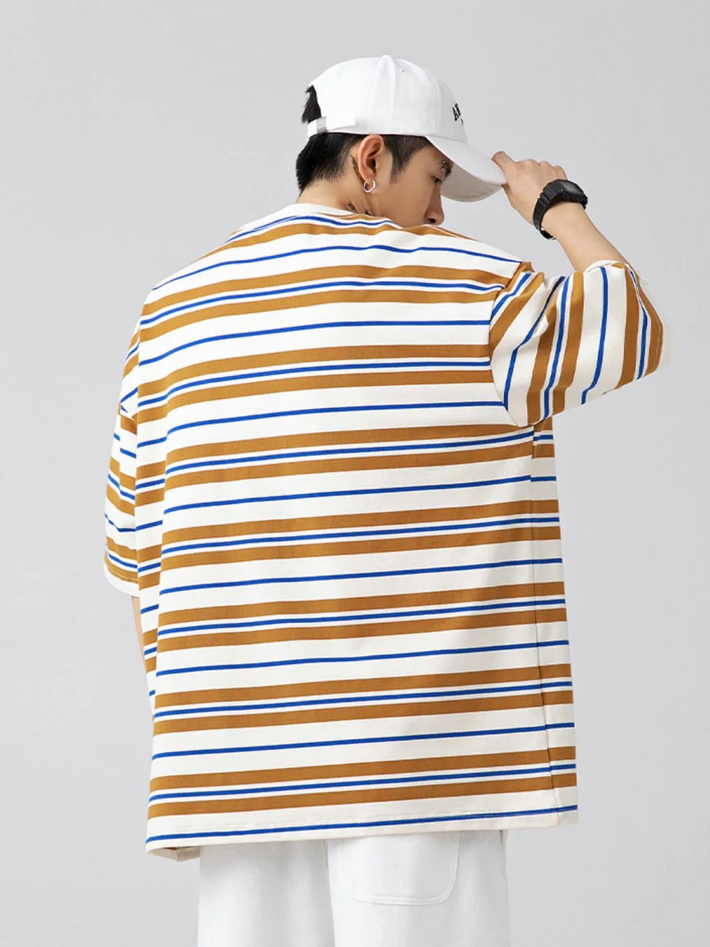 Male model wearing Men's camel brown urban short sleeve stripe t-shirt  back of shirt view